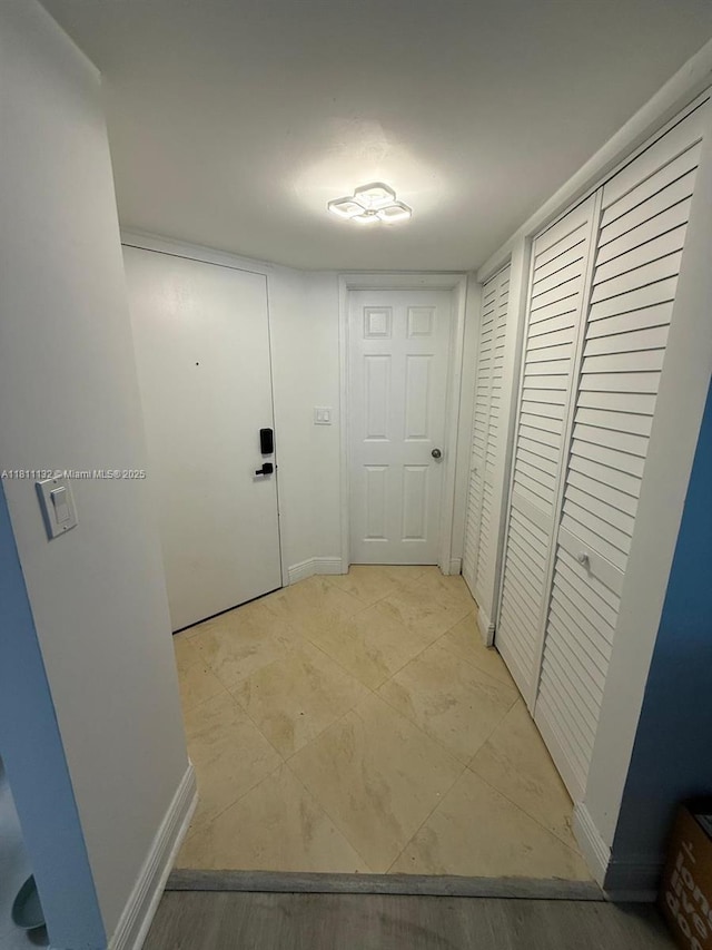 4730 NW 97th Ct Unit 76, Doral, FL 33178 - hall with baseboards