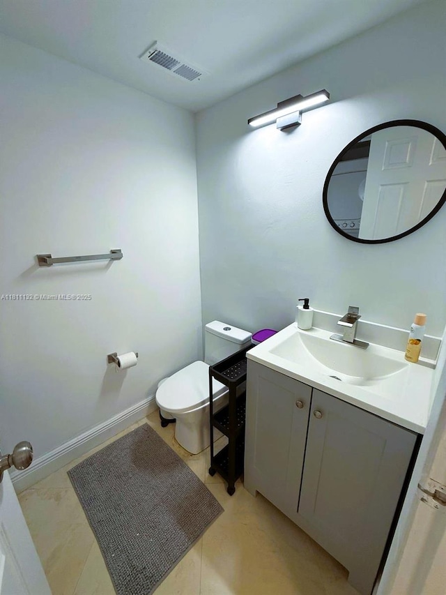 4730 NW 97th Ct Unit 76, Doral, FL 33178 - half bathroom featuring vanity and toilet