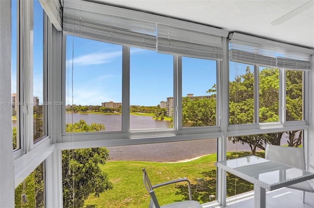 3091 N Course Dr Unit 502, Pompano Beach, FL 33069 - unfurnished sunroom featuring a water view
