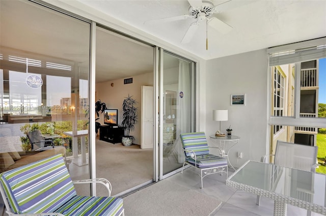 3091 N Course Dr Unit 502, Pompano Beach, FL 33069 - sunroom featuring a ceiling fan