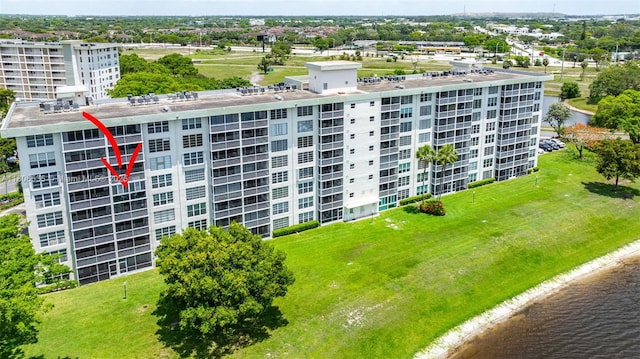 3091 N Course Dr Unit 502, Pompano Beach, FL 33069 - view of apartment building / complex with a water view