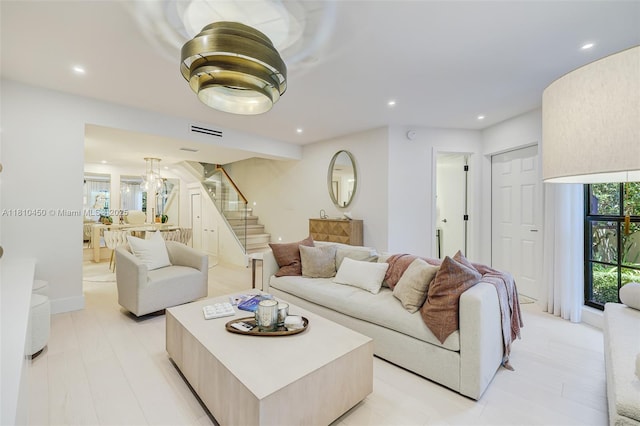 725 Biltmore Ct, Coral Gables, FL 33134 - living room featuring stairway, recessed lighting, and baseboards