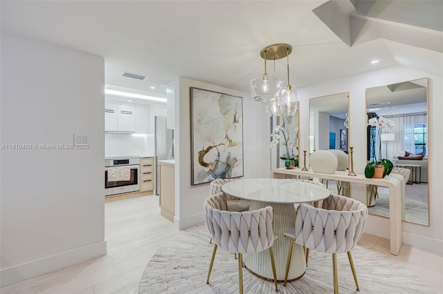 725 Biltmore Ct, Coral Gables, FL 33134 - dining area with recessed lighting, baseboards, and light wood finished floors