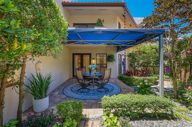 725 Biltmore Ct, Coral Gables, FL 33134 - view of patio featuring french doors