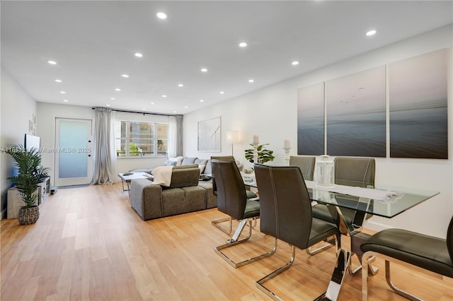 401 Golden Isles Dr Unit 302, Hallandale Beach, FL 33009 - dining area with recessed lighting and light wood-type flooring