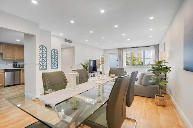 401 Golden Isles Dr Unit 302, Hallandale Beach, FL 33009 - dining space featuring light wood-type flooring, recessed lighting, and baseboards