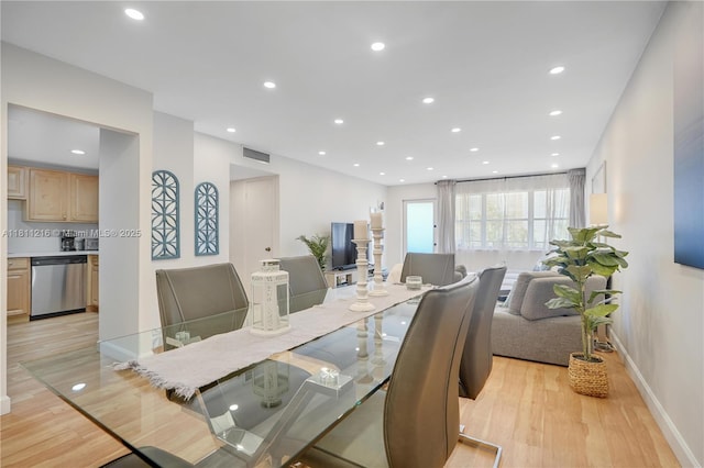 401 Golden Isles Dr Unit 302, Hallandale Beach, FL 33009 - dining space with light wood-style flooring, recessed lighting, and baseboards