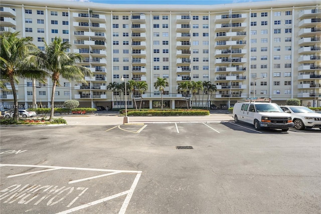 401 Golden Isles Dr Unit 302, Hallandale Beach, FL 33009 - view of apartment building / complex with uncovered parking