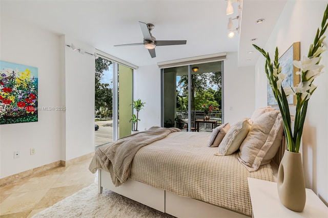 3001 SW 27th Ave Unit 201, Miami, FL 33133 - bedroom featuring access to exterior, floor to ceiling windows, and a ceiling fan