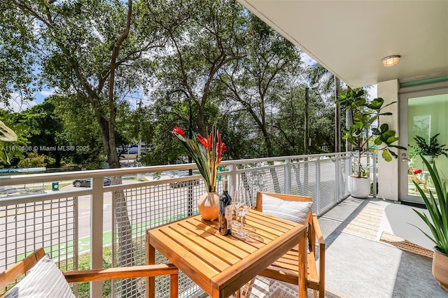 3001 SW 27th Ave Unit 201, Miami, FL 33133 - balcony with view of wooded area