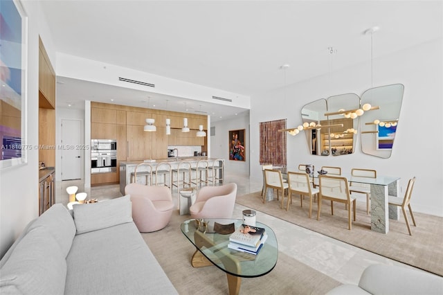 725 NE 22nd St Unit Ph3C, Miami, FL 33137 - living room featuring recessed lighting