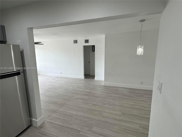 12801 SW 43rd Dr Unit 212-A, Miami, FL 33175 - spare room featuring wood finished floors and baseboards