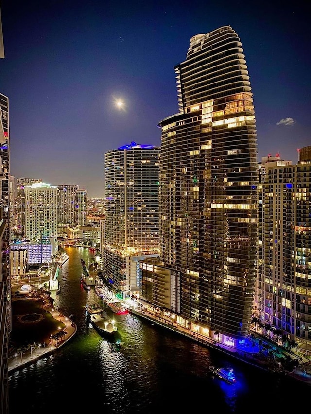 475 Brickell Ave Unit 1715, Miami, FL 33131 - view of city with a nearby body of water and a view of city lights