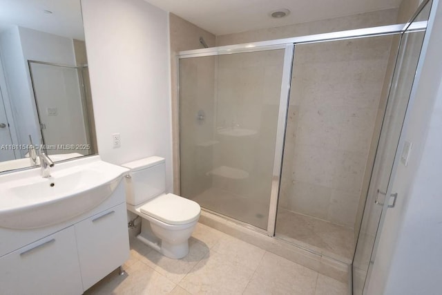 475 Brickell Ave Unit 1715, Miami, FL 33131 - full bathroom with toilet, vanity, a stall shower, and tile patterned flooring