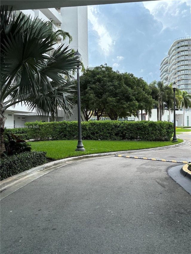 14951 Royal Oaks Ln Unit 1804, North Miami, FL 33181 - surrounding community with a lawn