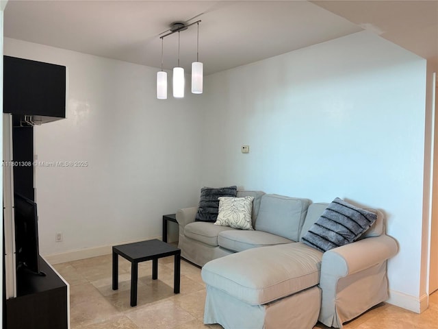 14951 Royal Oaks Ln Unit 1804, North Miami, FL 33181 - living room featuring baseboards and light tile patterned flooring