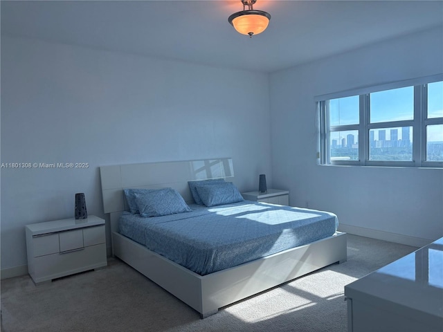 14951 Royal Oaks Ln Unit 1804, North Miami, FL 33181 - carpeted bedroom featuring baseboards