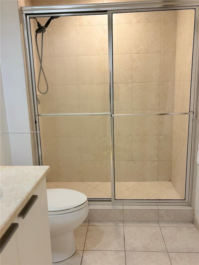 14951 Royal Oaks Ln Unit 1804, North Miami, FL 33181 - bathroom featuring a stall shower, vanity, and tile patterned flooring