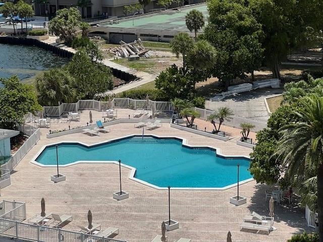 11111 Biscayne Blvd Unit 8C, Miami, FL 33181 - community pool featuring a patio