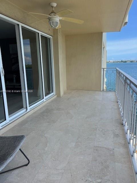11111 Biscayne Blvd Unit 8C, Miami, FL 33181 - balcony featuring ceiling fan and a water view