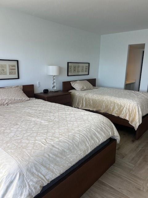 11111 Biscayne Blvd Unit 8C, Miami, FL 33181 - bedroom with wood finished floors