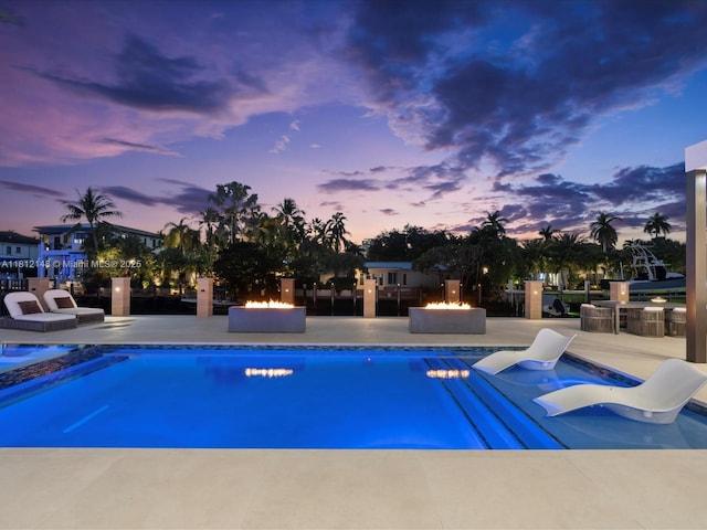 401 Bontona Ave, Fort Lauderdale, FL 33301 - swimming pool with a fire pit and a patio