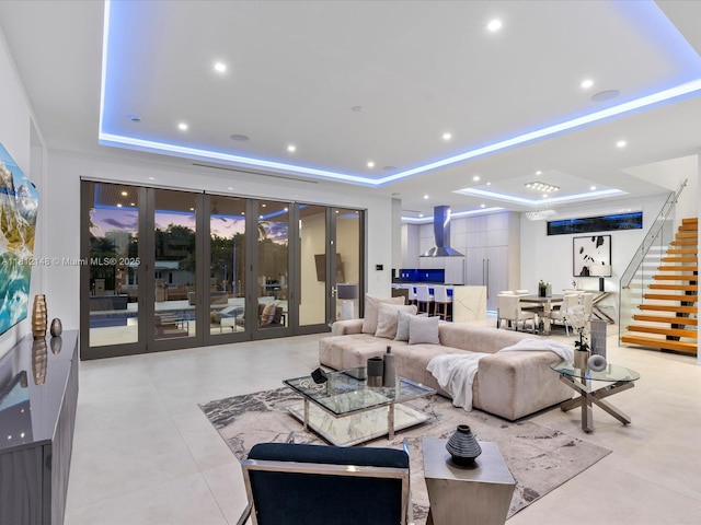 401 Bontona Ave, Fort Lauderdale, FL 33301 - living room with a tray ceiling, stairway, and recessed lighting