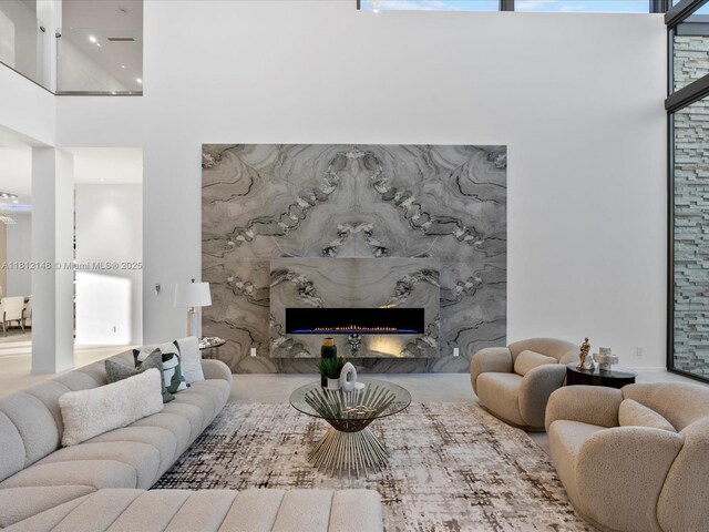 401 Bontona Ave, Fort Lauderdale, FL 33301 - living room with a towering ceiling and a fireplace