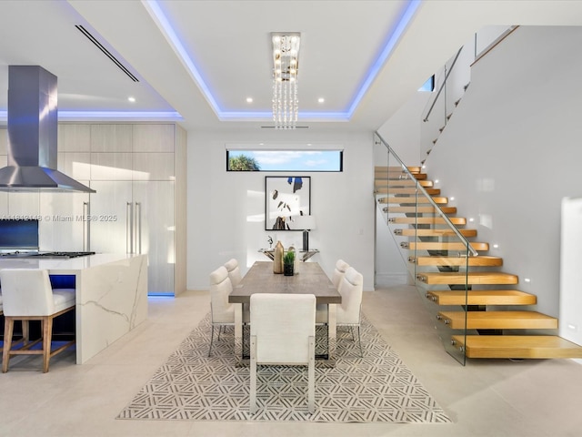 401 Bontona Ave, Fort Lauderdale, FL 33301 - dining area featuring stairs, a tray ceiling, and recessed lighting