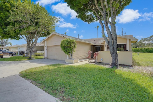 10 Afton Pl, Boynton Beach, FL 33426 - ranch-style house with a garage, driveway, and a front yard