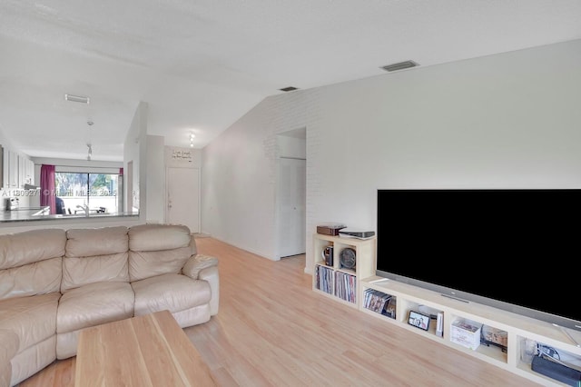 10 Afton Pl, Boynton Beach, FL 33426 - living room with wood finished floors and lofted ceiling