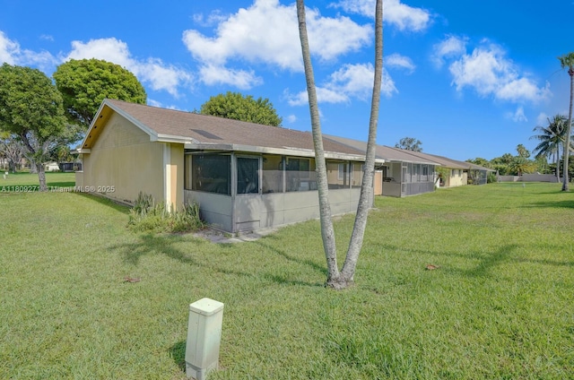 10 Afton Pl, Boynton Beach, FL 33426 - view of property exterior with a lawn