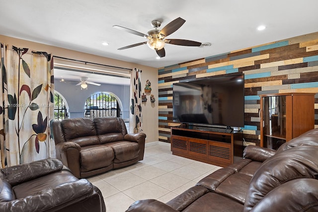 5808 Polk St, Hollywood, FL 33021 - living area with a ceiling fan, an accent wall, recessed lighting, tile patterned floors, and baseboards