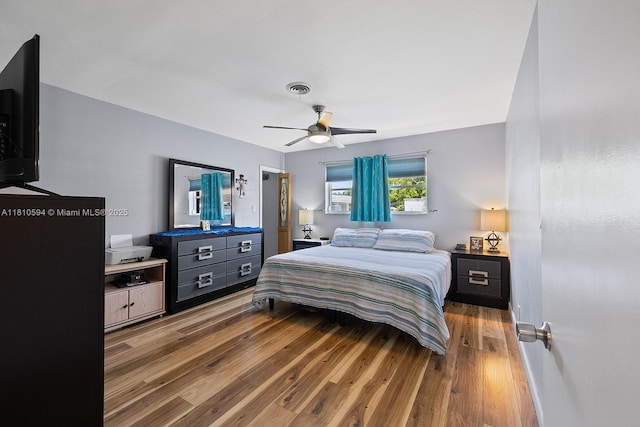 5808 Polk St, Hollywood, FL 33021 - bedroom with wood finished floors, a ceiling fan, and baseboards
