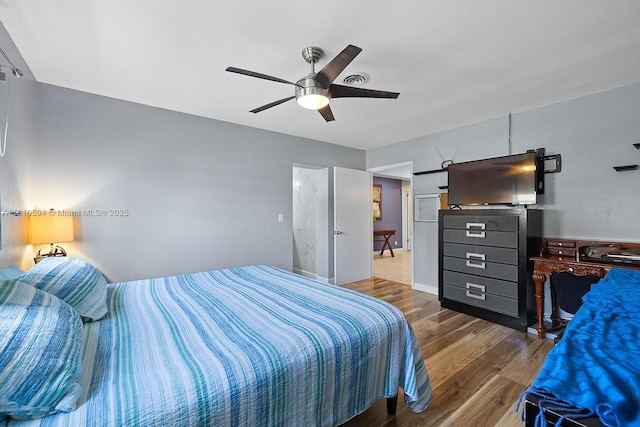 5808 Polk St, Hollywood, FL 33021 - bedroom featuring wood finished floors and a ceiling fan