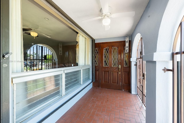 5808 Polk St, Hollywood, FL 33021 - entryway with ceiling fan and brick flooring