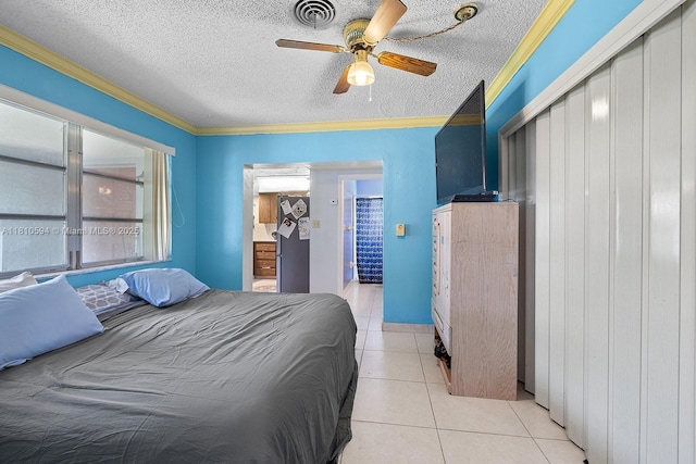 5808 Polk St, Hollywood, FL 33021 - bedroom with crown molding, light tile patterned floors, a textured ceiling, a closet, and ceiling fan