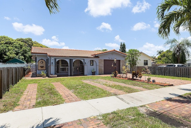 5808 Polk St, Hollywood, FL 33021 - mediterranean / spanish home with a tile roof, stucco siding, a garage, and driveway
