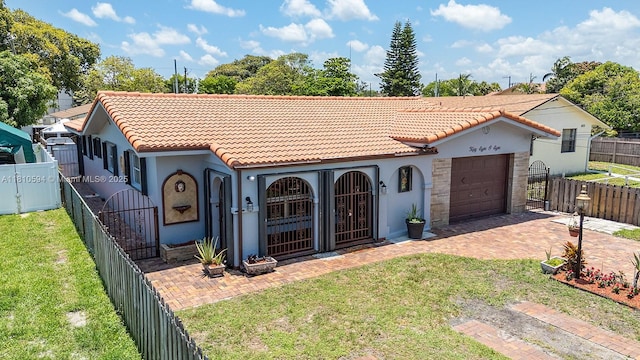 5808 Polk St, Hollywood, FL 33021 - mediterranean / spanish-style home with a tiled roof, a garage, stucco siding, and driveway