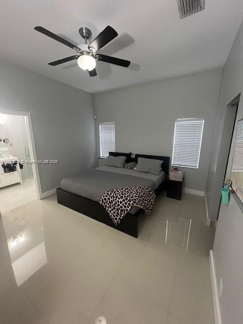 1020 Silktree Ln, Weston, FL 33327 - bedroom featuring tile patterned flooring, baseboards, and ceiling fan