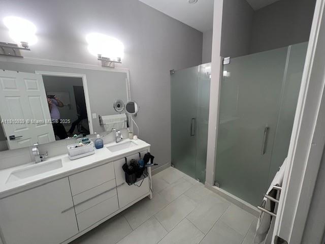1020 Silktree Ln, Weston, FL 33327 - full bathroom with a stall shower and double vanity