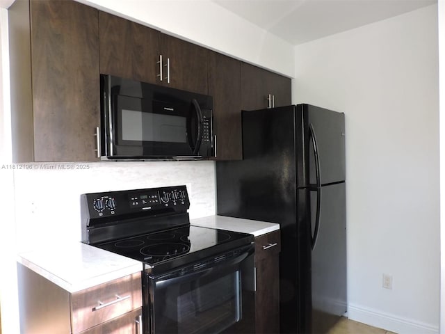 1331 S Franklin Ave Unit 1331E, Homestead, FL 33034 - kitchen featuring black appliances, light countertops, dark brown cabinetry, and decorative backsplash