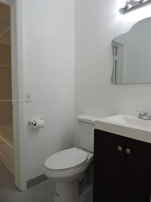 1331 S Franklin Ave Unit 1331E, Homestead, FL 33034 - full bath featuring tile patterned floors, vanity, toilet, and washtub / shower combination