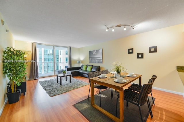 1200 Brickell Bay Dr Unit 2120, Miami, FL 33131 - living area featuring wood finished floors and baseboards