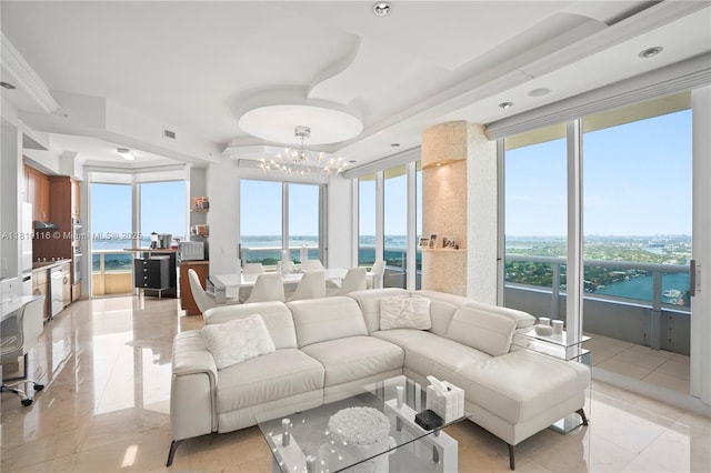 4775 Collins Ave Unit Ph4107, Miami Beach, FL 33140 - living area with a chandelier, a water view, plenty of natural light, and light tile patterned floors
