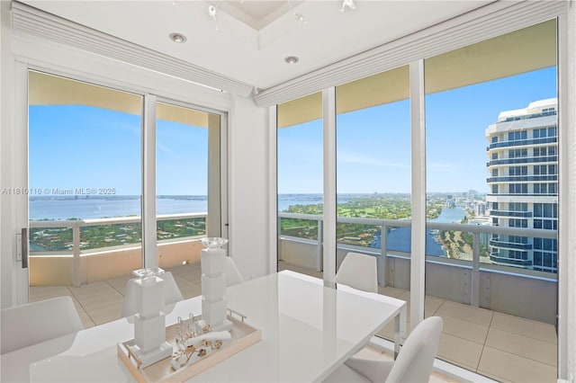 4775 Collins Ave Unit Ph4107, Miami Beach, FL 33140 - dining area with tile patterned flooring and a water view