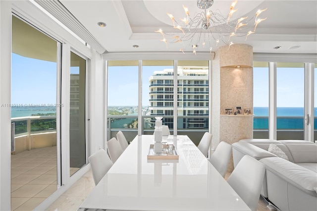 4775 Collins Ave Unit Ph4107, Miami Beach, FL 33140 - dining room with a water view, a chandelier, and healthy amount of natural light