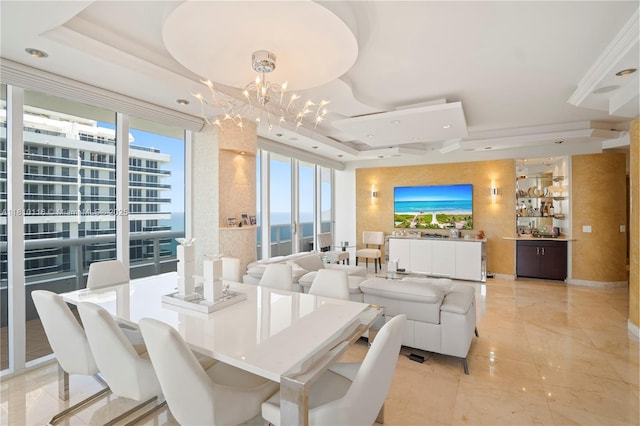4775 Collins Ave Unit Ph4107, Miami Beach, FL 33140 - dining area with a raised ceiling, a chandelier, healthy amount of natural light, recessed lighting, and bar