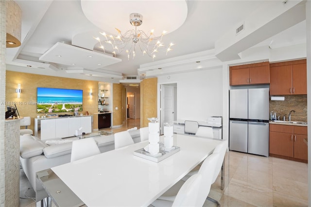 4775 Collins Ave Unit Ph4107, Miami Beach, FL 33140 - dining area featuring a raised ceiling, a chandelier, and recessed lighting
