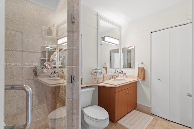 4775 Collins Ave Unit Ph4107, Miami Beach, FL 33140 - full bathroom with toilet, vanity, tiled shower, and stone tile flooring
